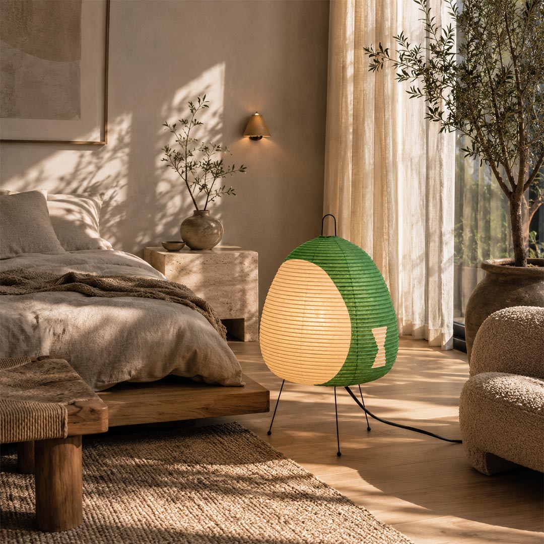 Japandi bedroom interior styling with warm ambient light from an Akari 1A paper lantern on the nightstand - Stuber Lighting