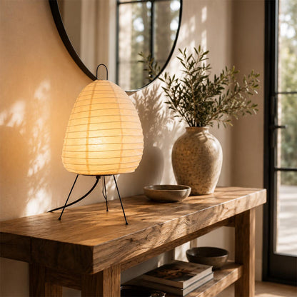 Wabi-sabi entryway decor with Akari 1N table lamp on a wooden bench - stuberlightin