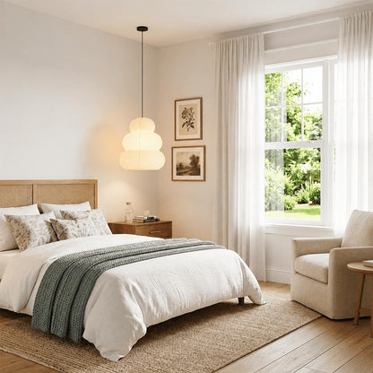 Cozy modern bedroom interior lighting with Akari 24N hanging paper lamp - Stuber Lighting