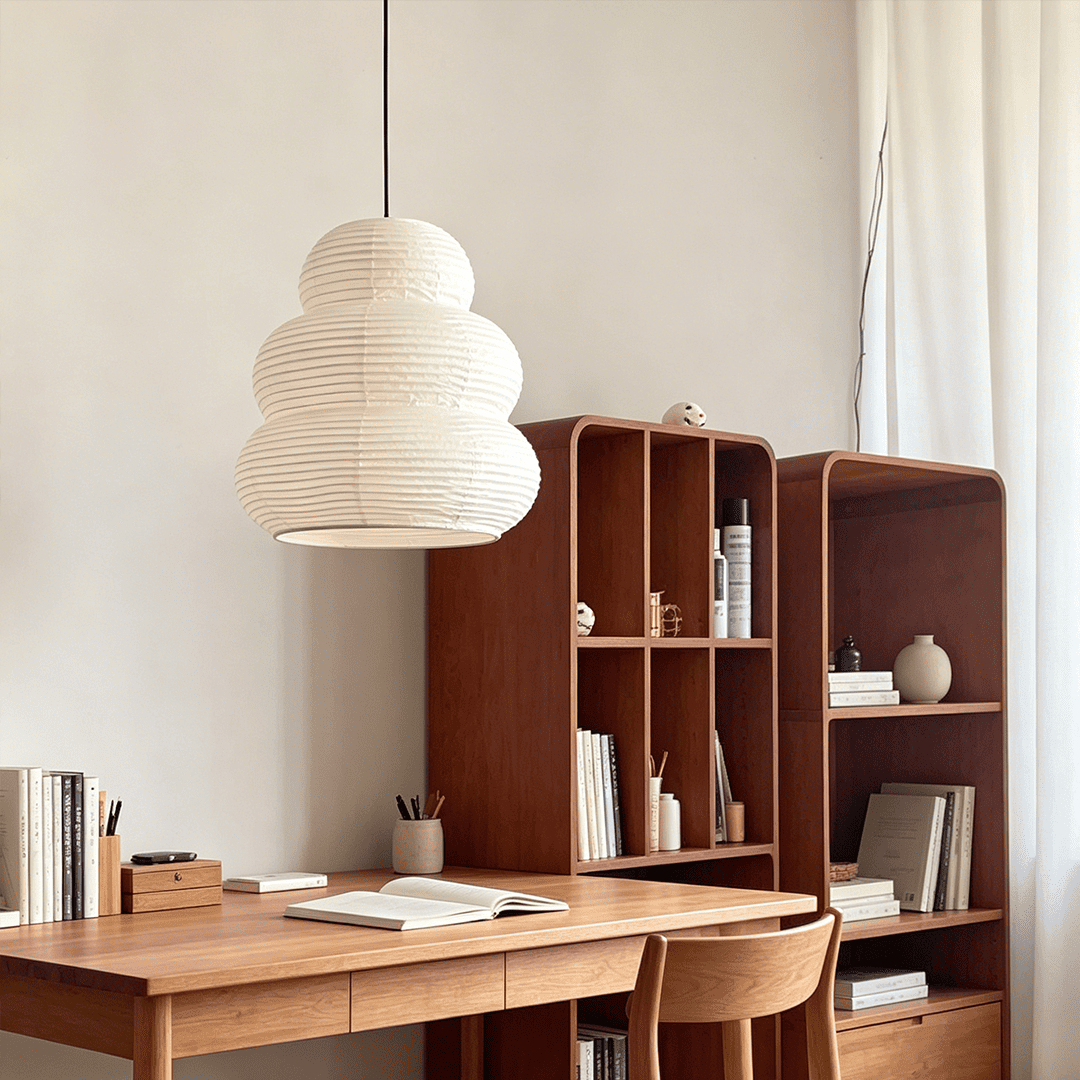 Japandi home office design with Akari 24N paper pendant light over a wooden desk - Stuber Lighting