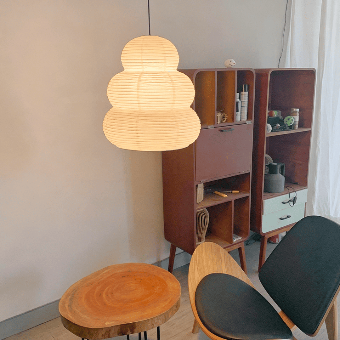 Mid-century modern lounge area styled with Akari 24N classic paper lantern light - Stuber Lighting