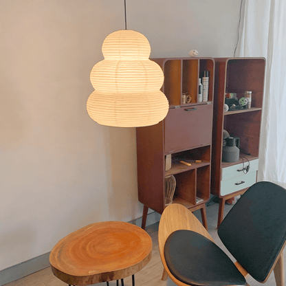Mid-century modern lounge area styled with Akari 24N classic paper lantern light - Stuber Lighting