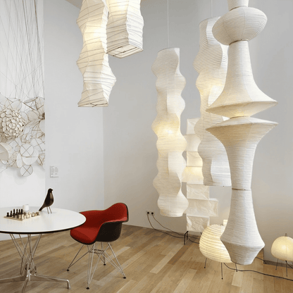 Akari E model pendant light in a minimalist dressing room setting.