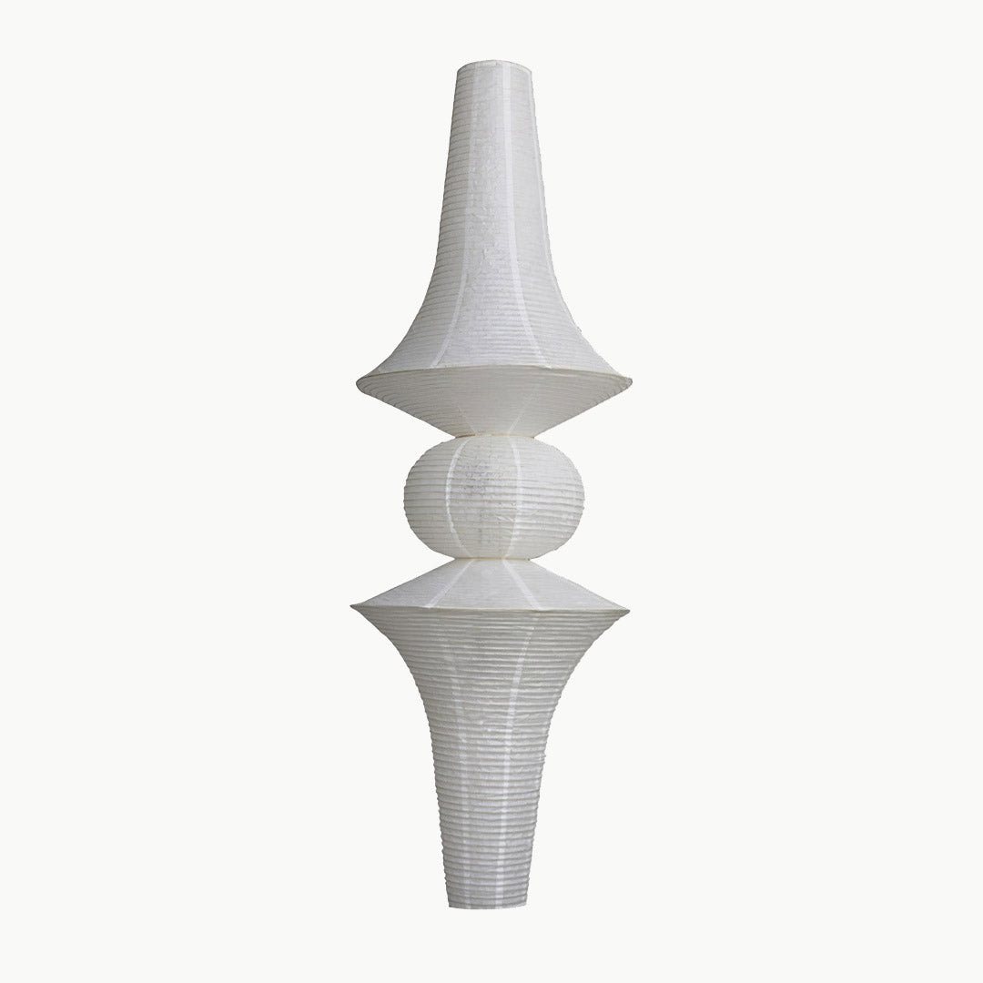 Akari E model pendant light in a minimalist dressing room setting.
