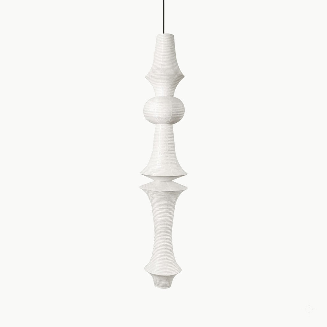 Akari E model pendant light in a minimalist dressing room setting.