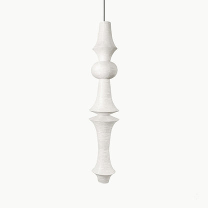 Akari E model pendant light in a minimalist dressing room setting.