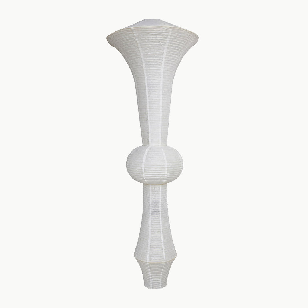 Akari E model pendant light in a minimalist dressing room setting.