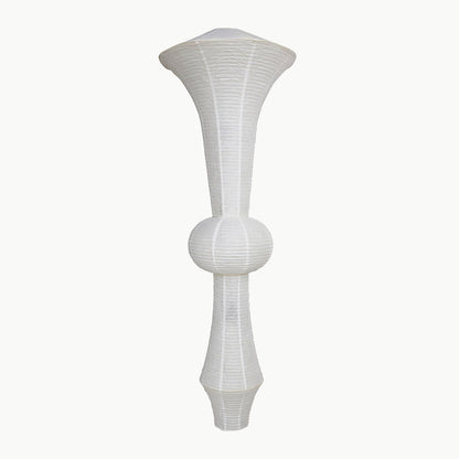 Akari E model pendant light in a minimalist dressing room setting.