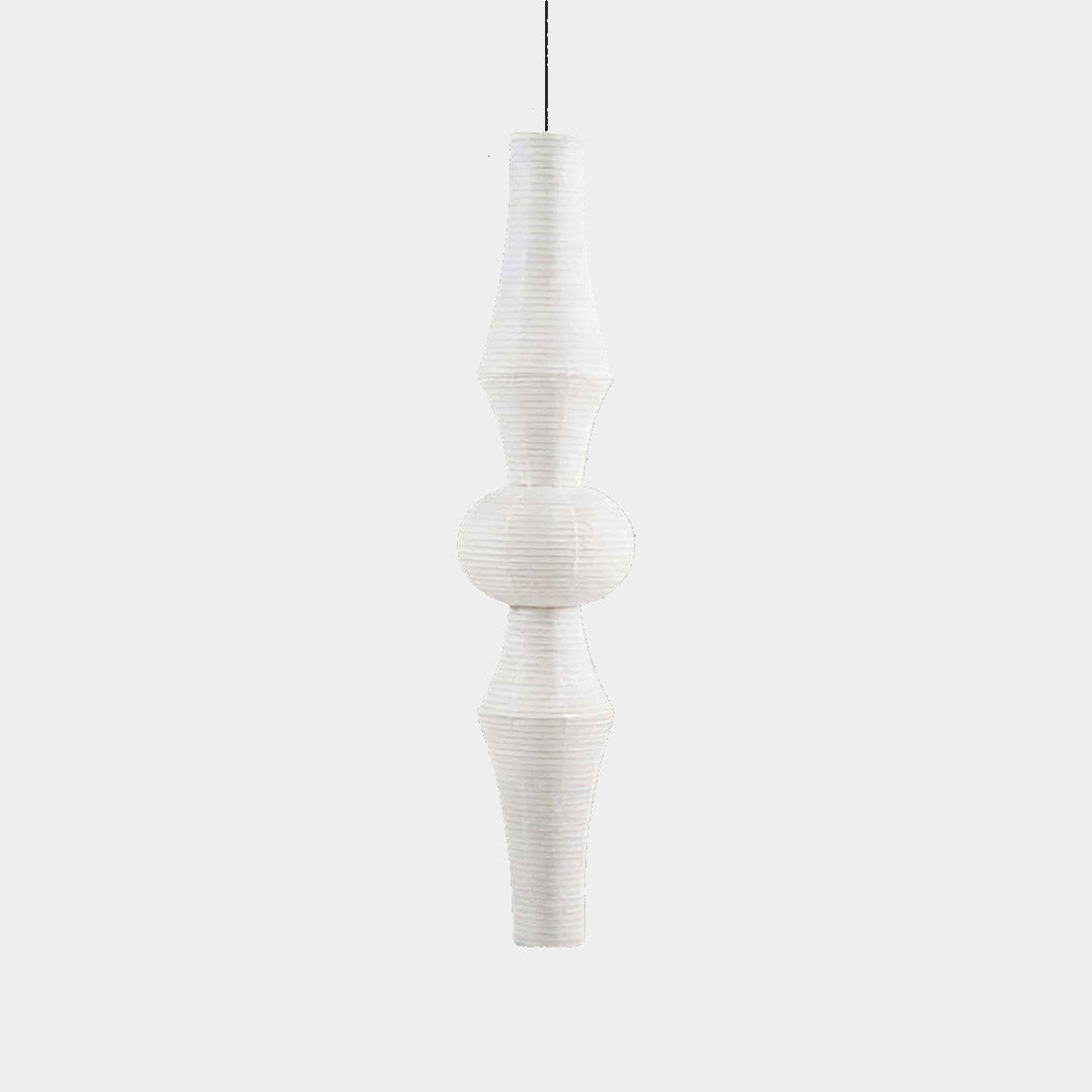 Akari E model pendant light in a minimalist dressing room setting.