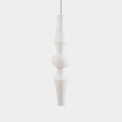 Akari E model pendant light in a minimalist dressing room setting.