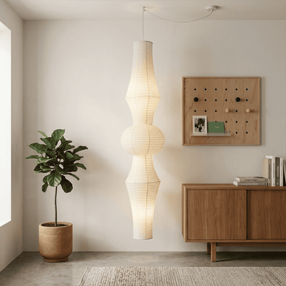 Akari E model pendant light in a minimalist dressing room setting.