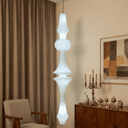 Akari E model pendant light in a minimalist dressing room setting.