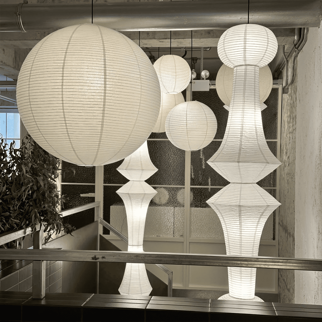 Akari E model pendant light in a minimalist dressing room setting.