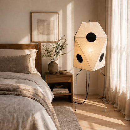 Cozy bedroom lighting setup with warm light from Akari UF3-Q rice paper lamp - stuberlighting