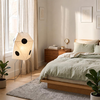 Cozy bedroom lighting setup with warm light from Akari UF3-Q rice paper lamp - stuberlighting