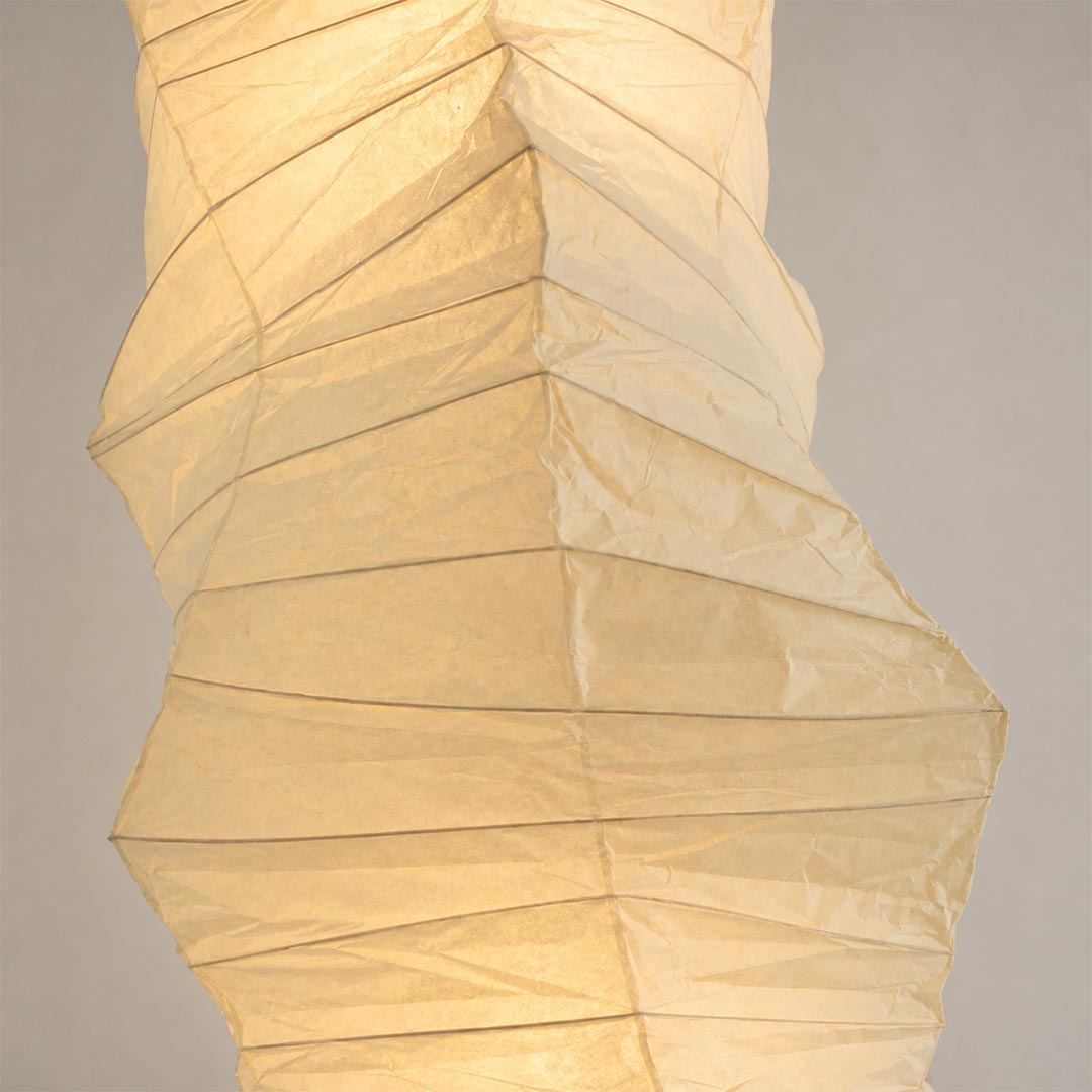 Close-up shot of Akari UF4 33N floor lamp showing handcrafted rice paper texture - stuberlighting