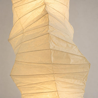 Close-up shot of Akari UF4 33N floor lamp showing handcrafted rice paper texture - stuberlighting