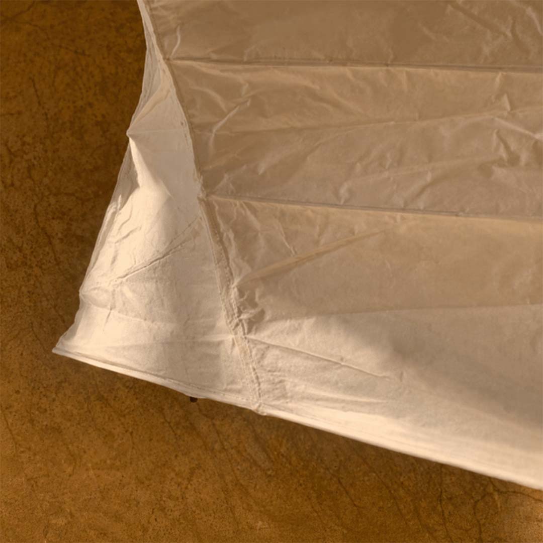 Close-up shot of Akari UF4 33N floor lamp showing handcrafted rice paper texture - stuberlighting