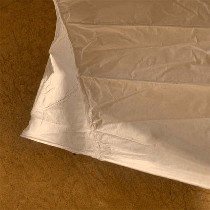 Close-up shot of Akari UF4 33N floor lamp showing handcrafted rice paper texture - stuberlighting