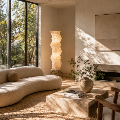 Modern tall rice paper light Akari UF4 33N floor lamp in a Japandi style living room corner - stuberlighting