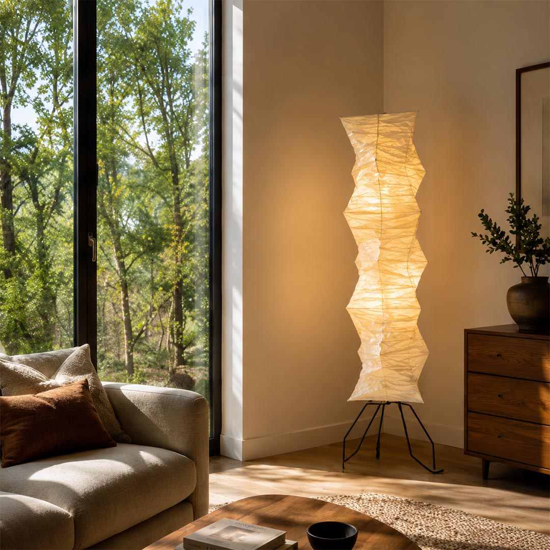 Modern tall rice paper light Akari UF4 33N floor lamp in a Japandi style living room corner - stuberlighting