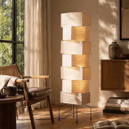 Wabi-sabi home styling with Akari UF4-L10 paper floor lamp and wooden chair - stuberlighting