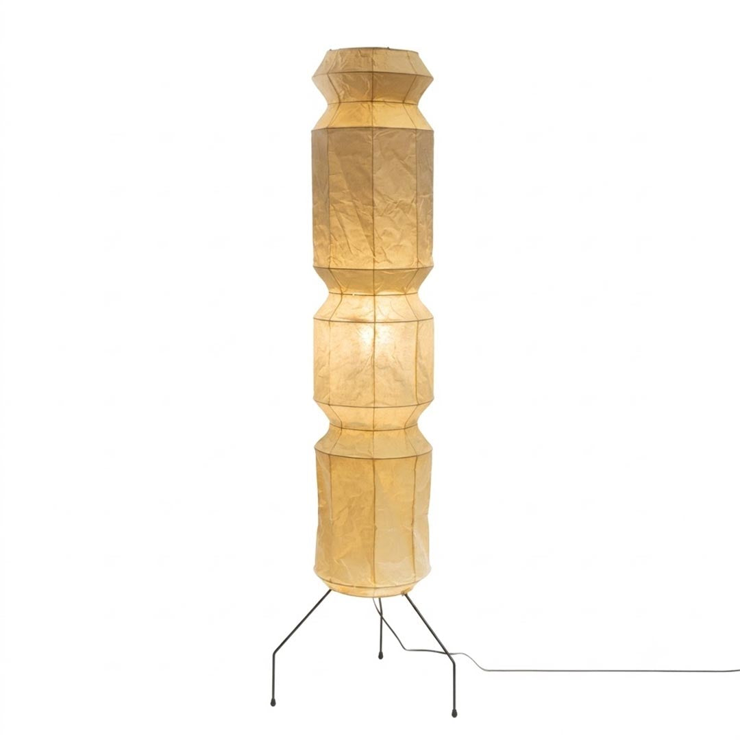 Glowing Akari UF4-L6 floor lamp warm ambient lighting on white background - stuberlighting
