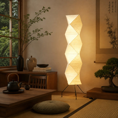 Akari UF4-L8 floor lamp living room corner soft glow washi paper tall sculptural Japanese minimalist cozy American home lifestyle interior styled