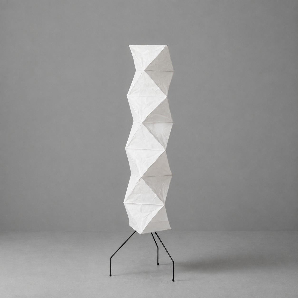 Akari UF4-L8 floor lamp white washi rice paper shade tall sculptural minimalist Japanese white background front view
