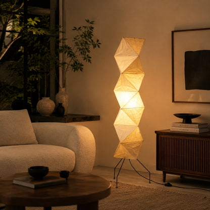 Akari UF4-L8 floor lamp living room corner soft glow washi paper tall sculptural Japanese minimalist cozy American home lifestyle interior styled