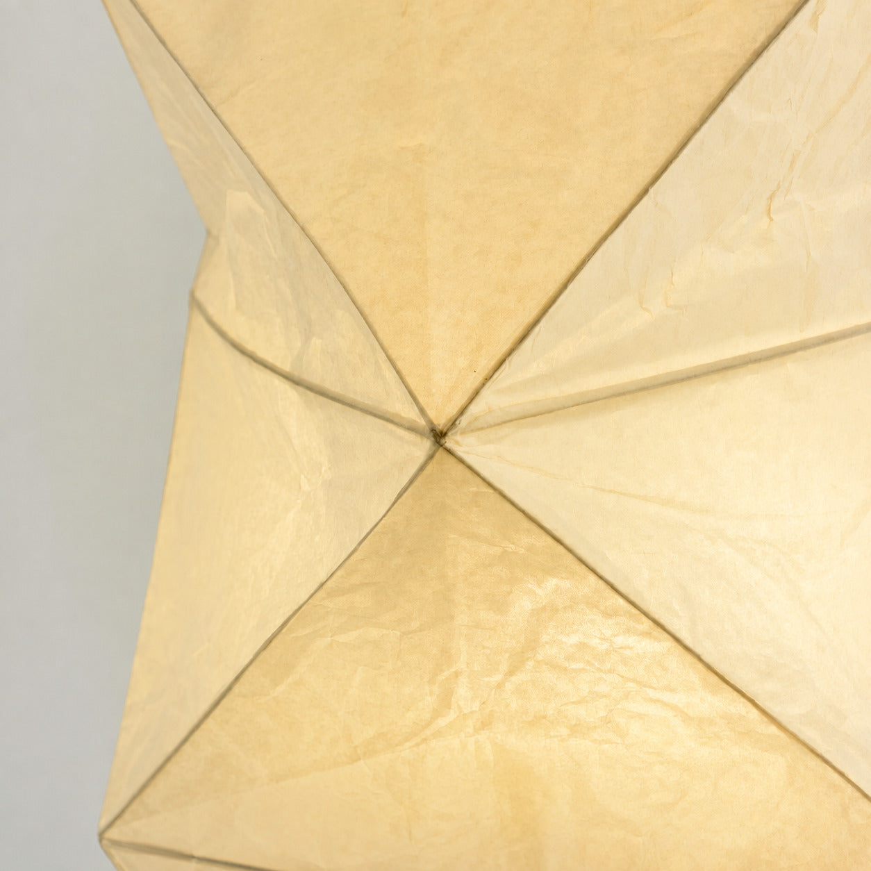 Akari UF4-L8 floor lamp washi rice paper shade texture translucent glow ribbed frame detail close up craftsmanship