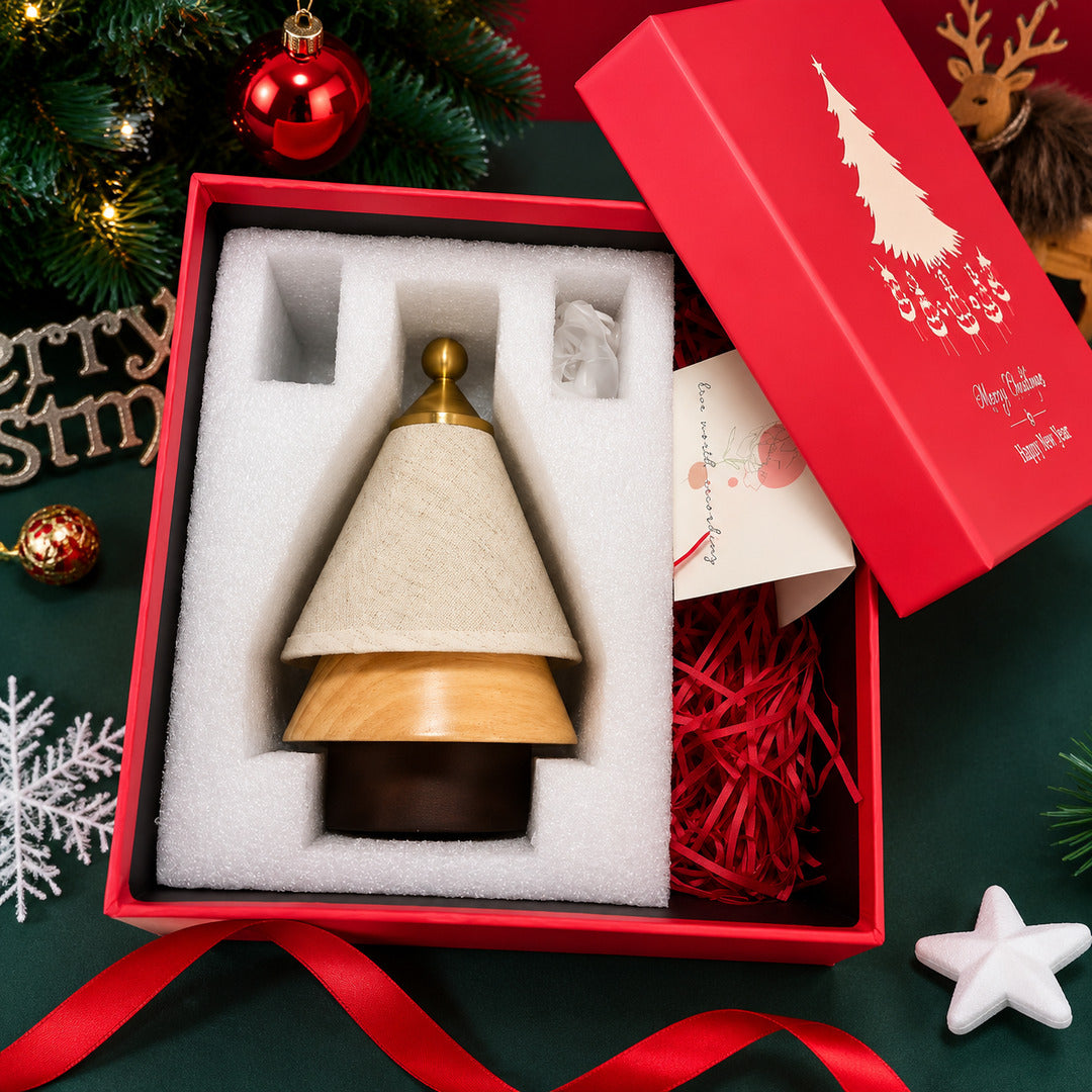 Alberello Christmas tree lamp nestled in a red holiday gift box with a greeting card