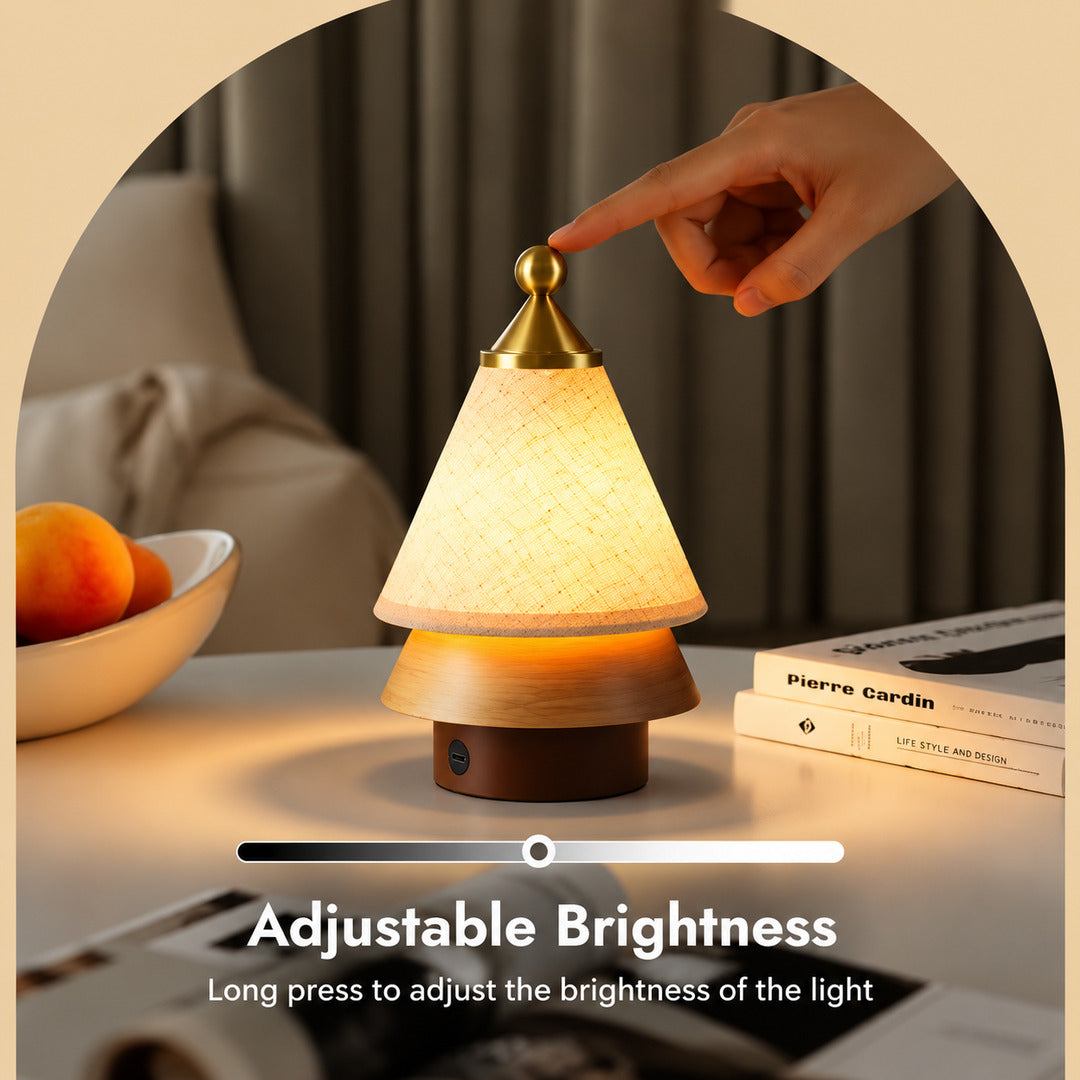 Alberello cordless lamp dimmed from bright to a soft night glow by long-pressing the top