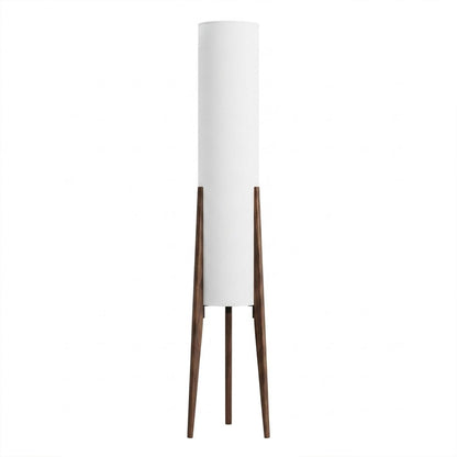 Alto walnut tripod floor lamp beside armchair living room warm light mid century modern interior