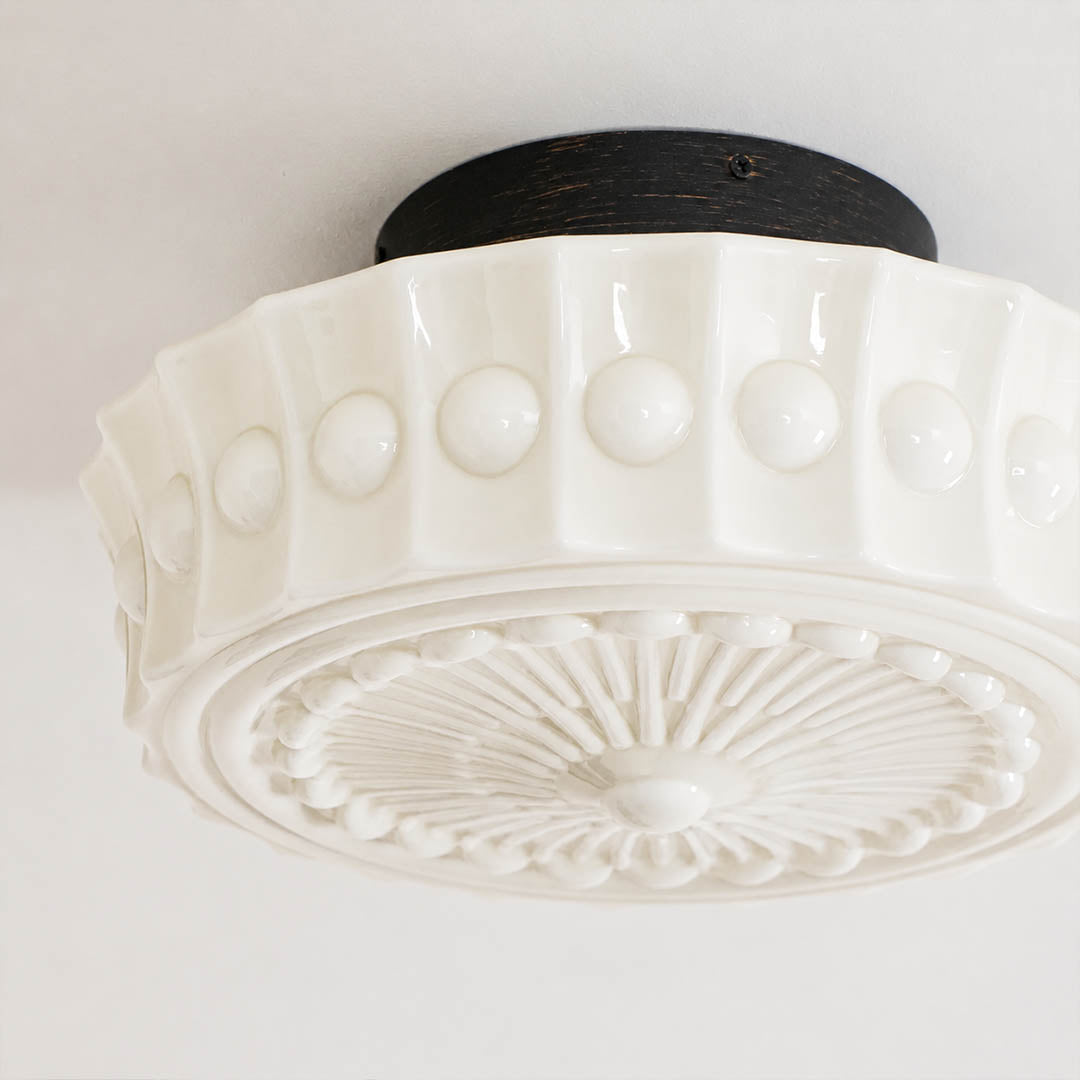 Amalfi round ceiling light embossed lace floral art deco pattern milk glass shade detail close up texture craftsmanship