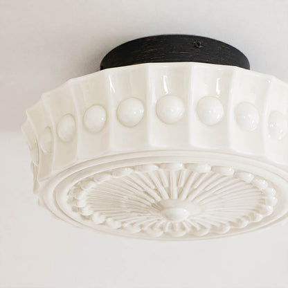 Amalfi round ceiling light embossed lace floral art deco pattern milk glass shade detail close up texture craftsmanship