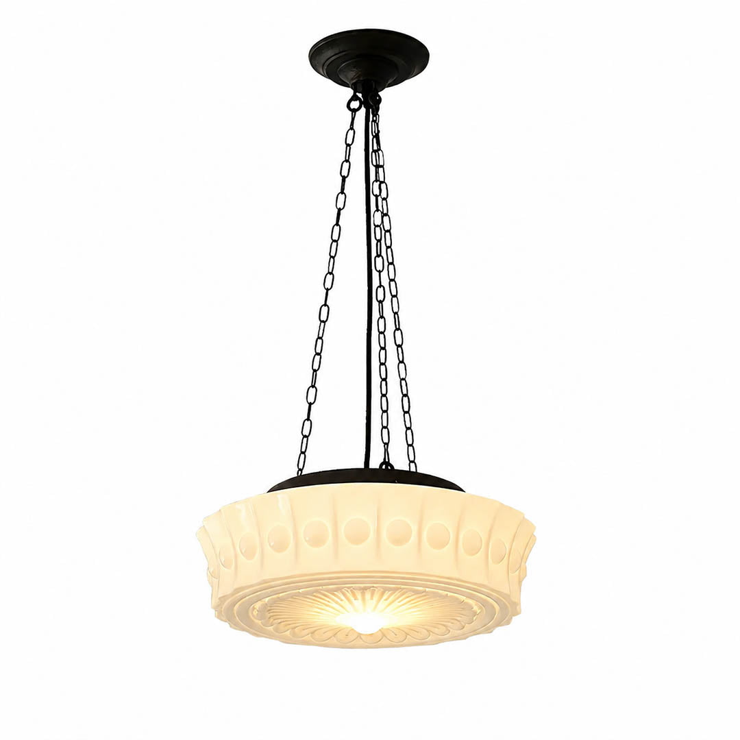 Amalfi round pendant light illuminated warm glow patterned milk glass dome soft textured vintage hanging white background