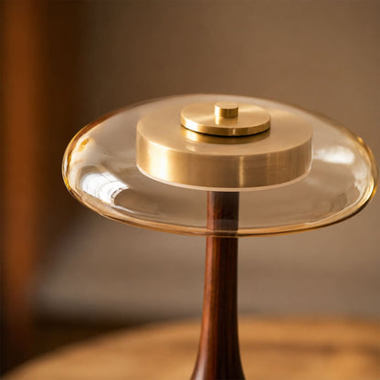 Ambra table lamp signature amber glass shade dome warm golden translucent glow honey rich saturated detail close up craftsmanship