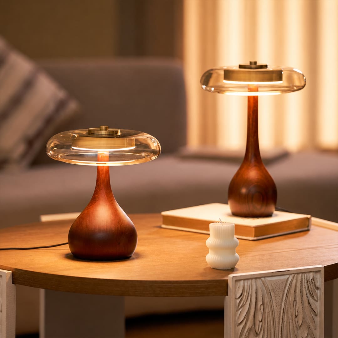 Ambra table lamp size scale reference short 9.8 inch tall 12.6 inch next to book hand size reference compact bedside accent proportional reference
