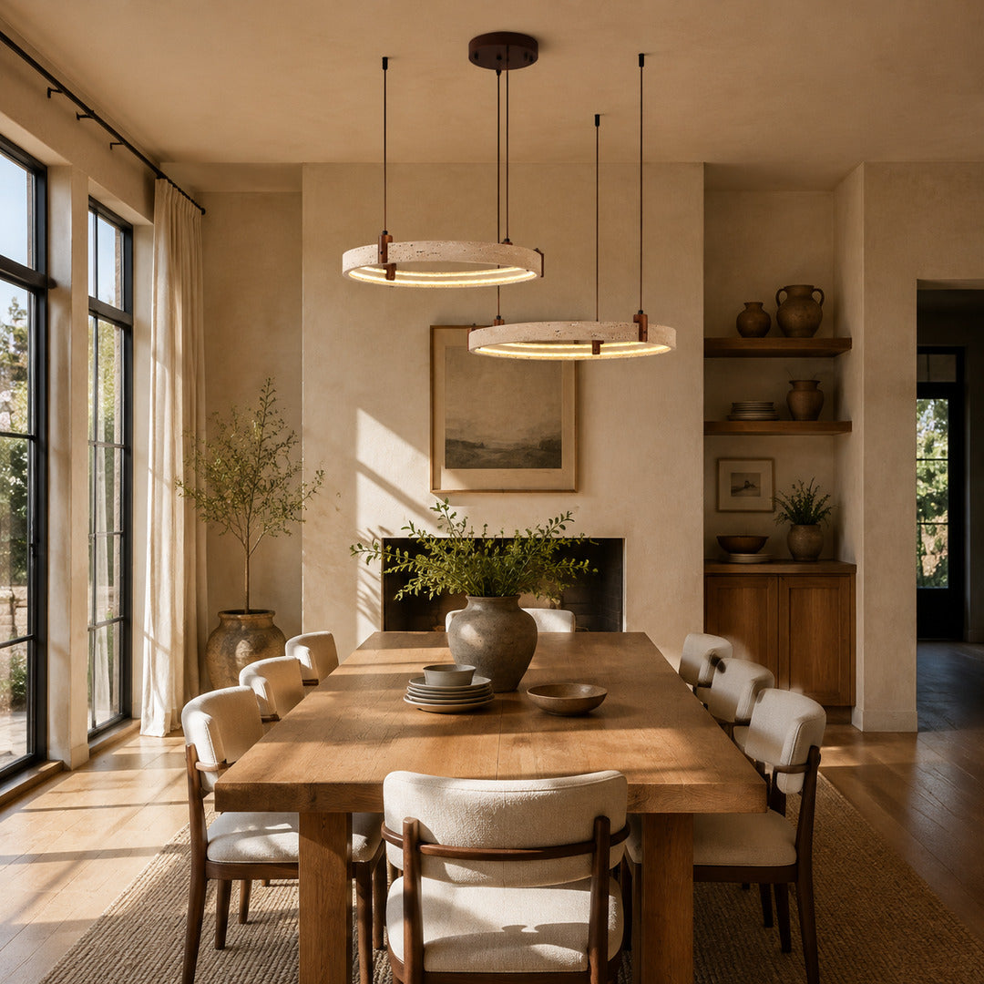Anelli travertine chandelier dining room table warm glow travertine stone rings Japandi American home lifestyle interior styled