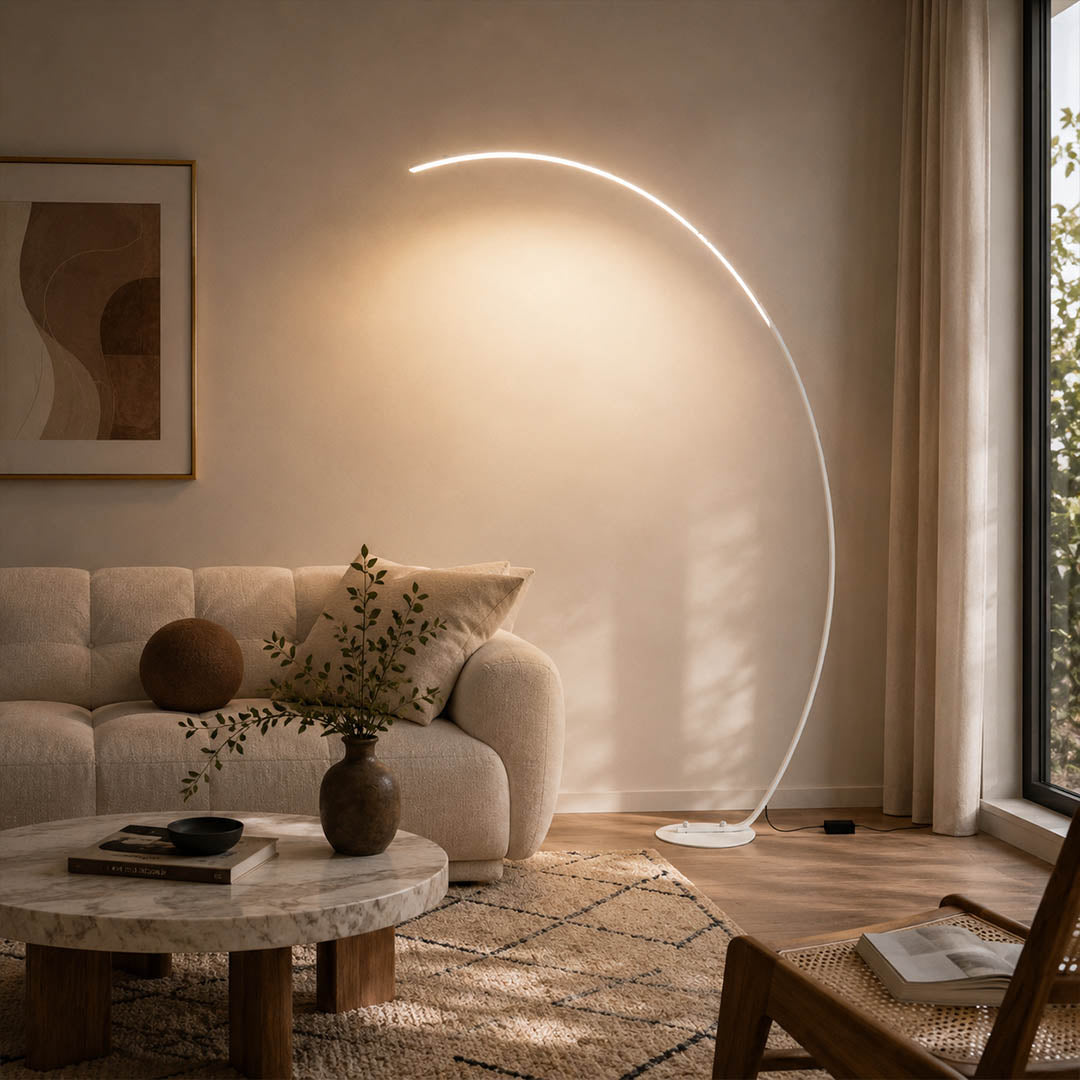 Arco floor lamp white modern living room sofa overhead reach arc curved statement mid century Italian minimalist warm ambient sculptural elegant lifestyle interior