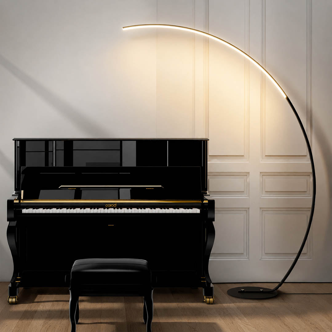 Arco floor lamp white modern living room sofa overhead reach arc curved statement mid century Italian minimalist warm ambient sculptural elegant lifestyle interior
