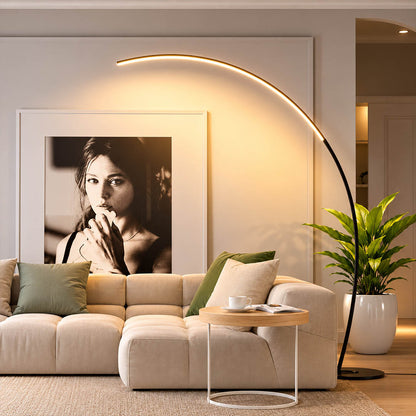 Arco floor lamp black modern living room sectional sofa overhead reach arc curved statement mid century Italian minimalist warm ambient sculptural elegant lifestyle interior