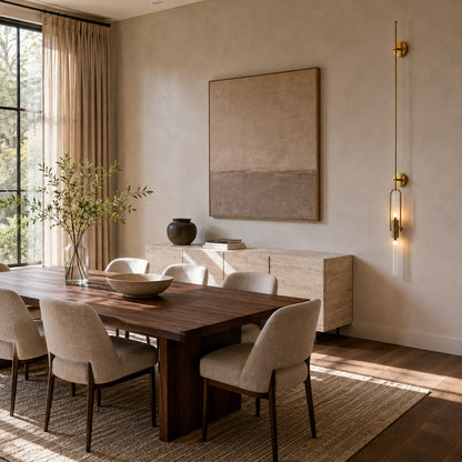 Arco glass wall sconces adding slim modern accents along an upscale restaurant wall