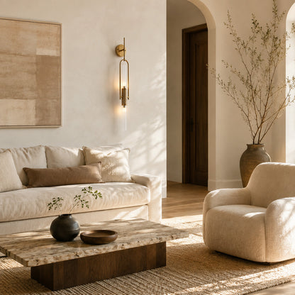 Arco glass wall sconce as a slim modern accent on a living room wall
