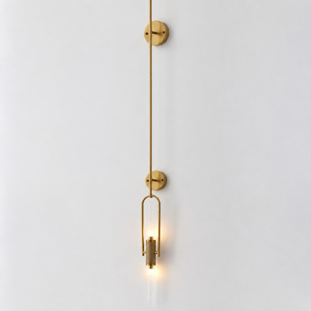Long 59.1-inch gold Arco glass wall sconce as a dramatic accent on a tall stairwell wall