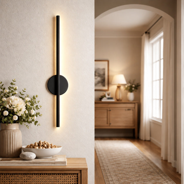 Asse cordless wall sconce welcoming guests beside an entry console with no wiring