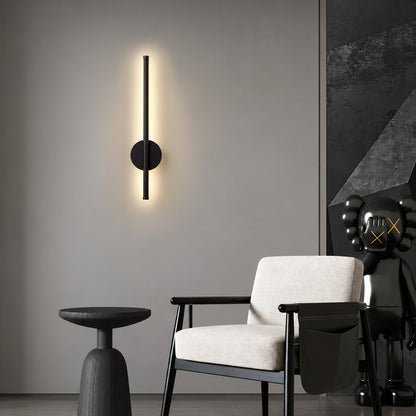 Asse cordless linear wall sconce lighting a reading nook without any wiring