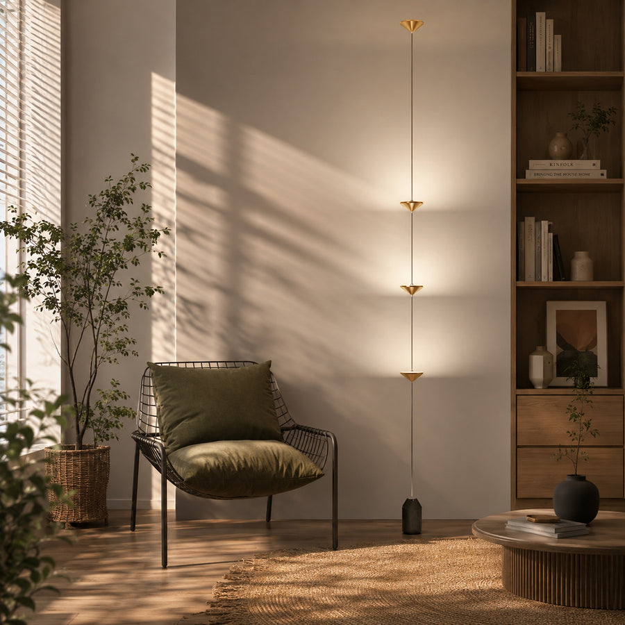 Asta floor lamp reading nook corner warm glow gold black floor to ceiling ambient American home lifestyle interior styled