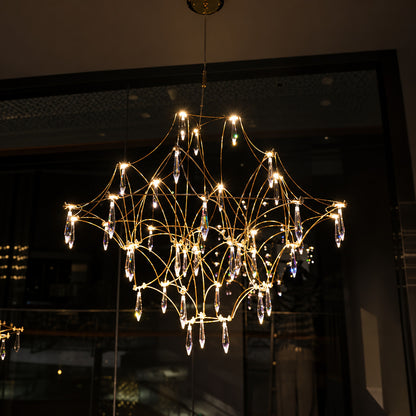 Detail of the geometric stainless steel wire frame of the Astra crystal chandelier